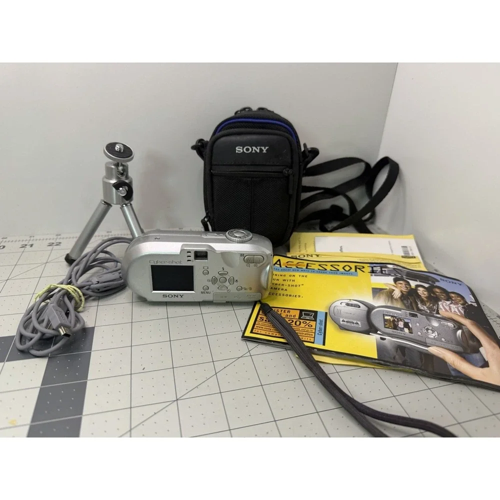 Sony Cyber-shot DSC-P73 4.1MP Digital Camera Silver Bundle Tripod Case